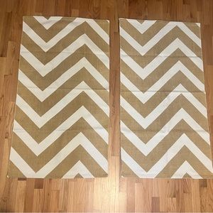 Pair of West Elm throw rugs